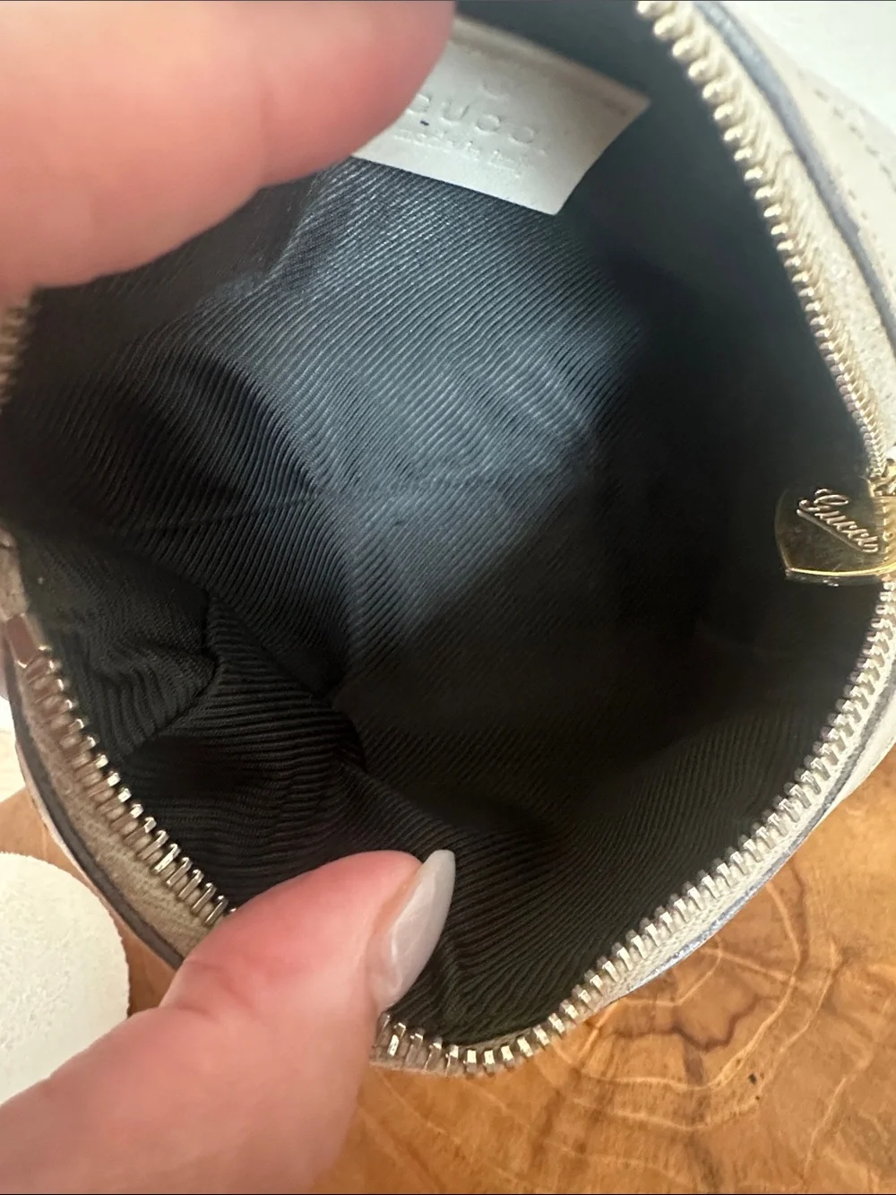Gucci Embossed GG Leather Pouch